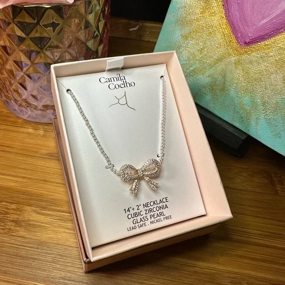 Camila Coelho Silver Cubic Zirconia Bow Necklace on strand of small faux pearls - Picture 5 of 10